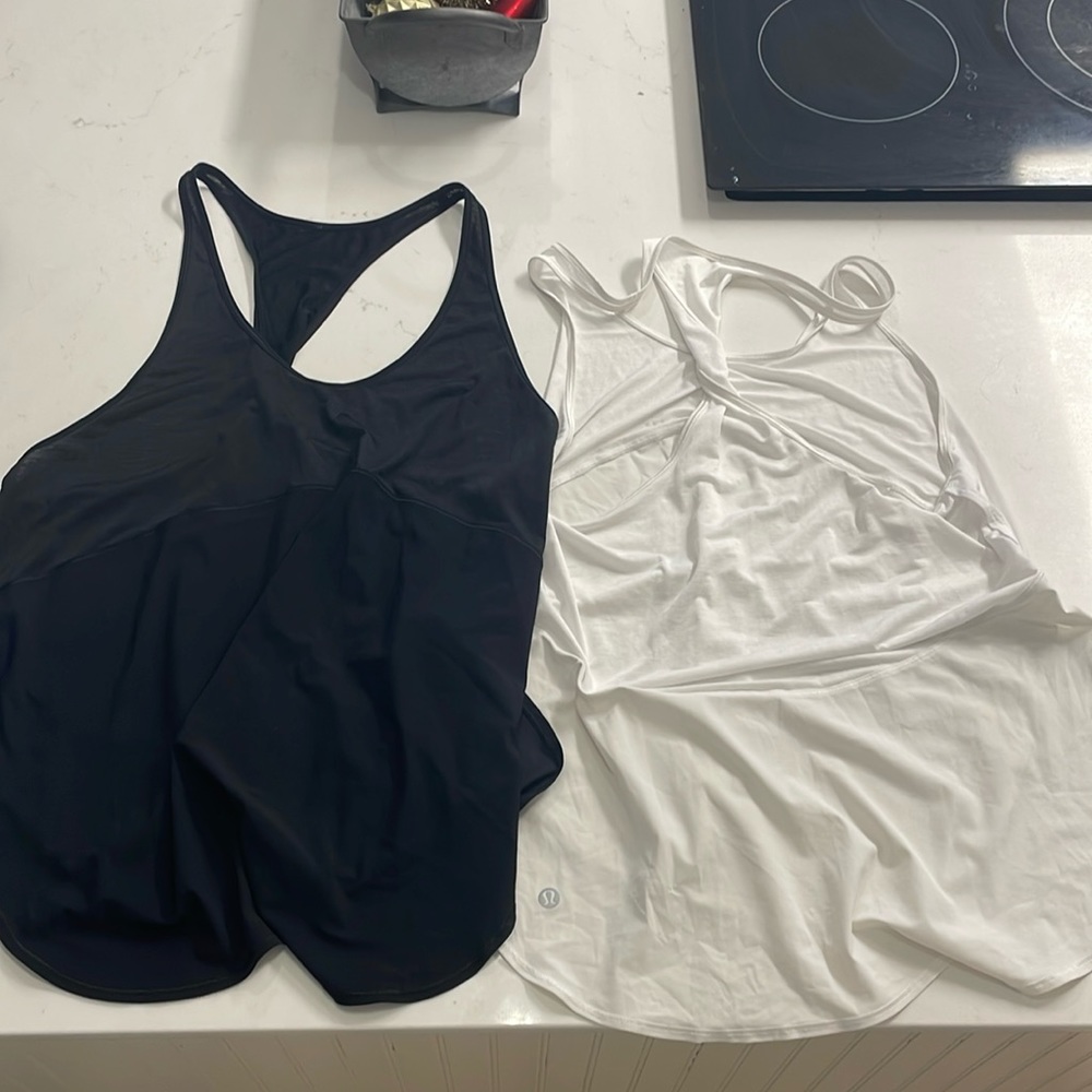 Black and white Lululemon tank tops